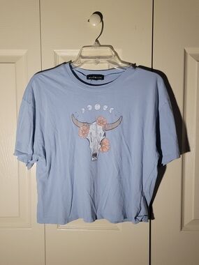 Women's Light Blue Graphic Tee with Floral Bull Skull